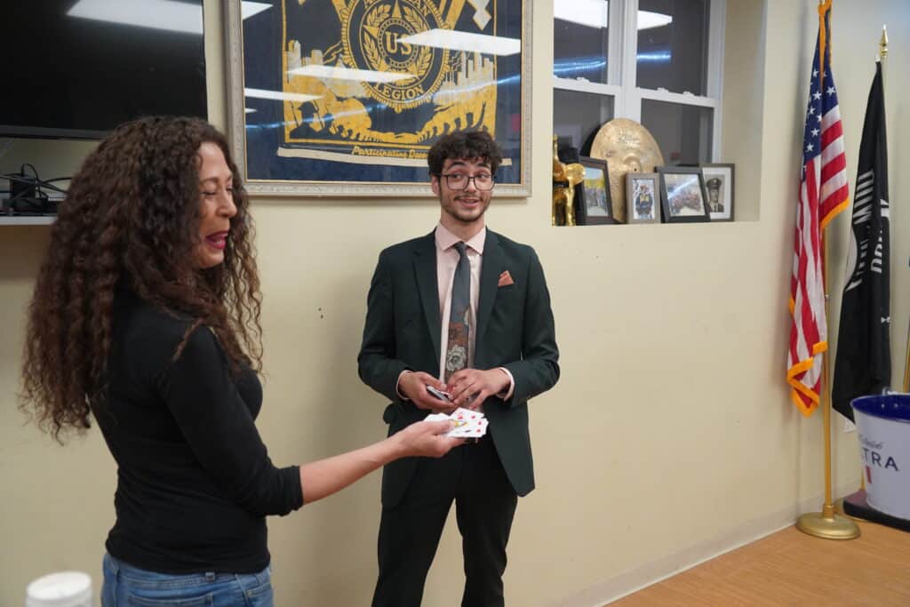 An Attendee is enjoing Matt The Mystic's Mentalism show.